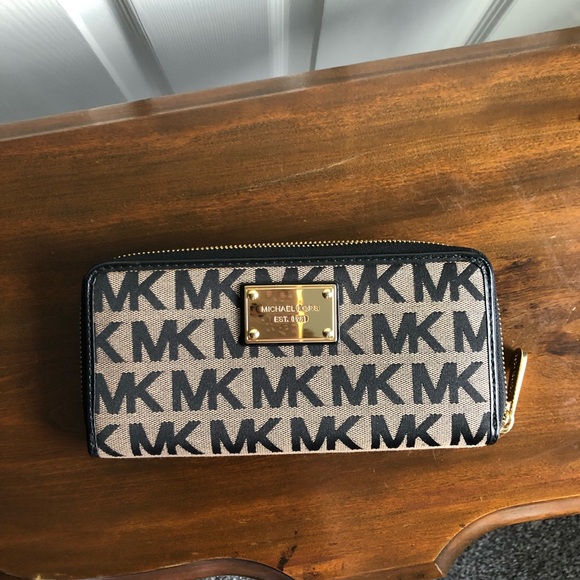 Handbags - Michael Kors Large Zip Around Continental Wallet.